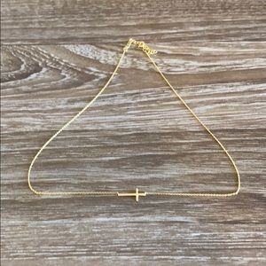 Gold small sideways cross necklace
